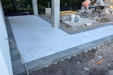 Concrete pad and framed wall